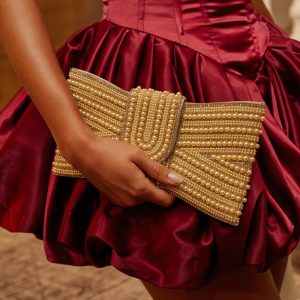 DRESSED TO IMPRESS PEARL BAG IN GOLD